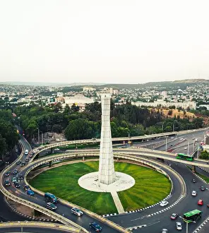 Roundabout Prints: Tbilisi, Georgia - 15th july, 2022: aerial view automobiles in traffic on roundabout in Tbilisi center