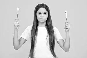 Dental Prints: Teen girl hold toothbrush, childhood happiness