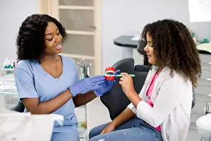 Dentistry Prints: Teeth hygiene. Cute happy child girl with red curly hair