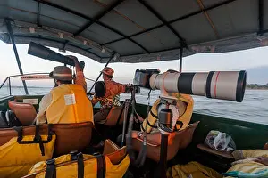 Wildlife Reserve Prints: The Telephoto lenses of Wildlife Photographers during the boat ride safari inside Kabini Nagarhole Tiger Reserve