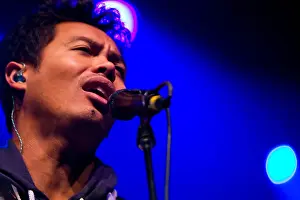 Indie Prints: The Temper Trap Singer Dougy Mandagi singing a song during a rock concert