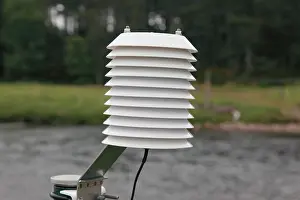 Thermometer Prints: A temperature gauge protected by a radiation shield at a weather station by Polhollick Bridge