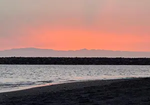 Tenerife Prints: A Tenerife beach with black volcanic sand at sunset