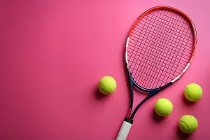Racket Prints: Tennis racket and balls on pink background, flat lay. Space for text