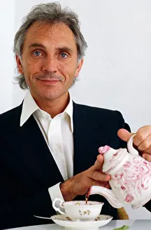Film Star Prints: Terence Stamp English actor and author pours a cup of tea