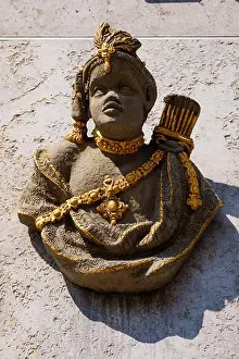 Swabia Prints: Terracotta figure of the Three Moors on the exterior facade of the Hotel Drei Mohren