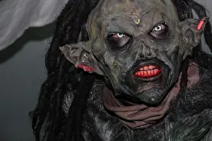 Devil Prints: Terrifying portrait of wild orc in medieval festival