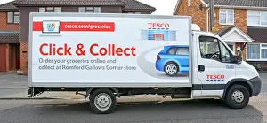 Vans Prints: Tesco home delivery van dropping off groceries in a residential street with advert for Click & Collect service