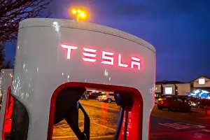 Car Park Prints: A Tesla Supercharger station at a commercial shopping centre in Sheffield UK