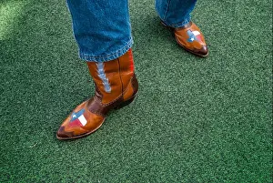 Imitation Prints: A Texan displays his pride of the lone star state with his custom cowboy boots