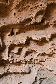 Karst Prints: Texture of sandstone in a cave in the rays of the sun
