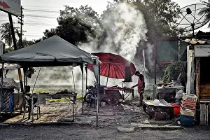 Unhygienic Prints: Thai street vendor preparing food. Dubious attention to hygiene. Thailand S. E. Asia