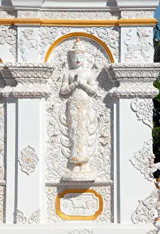 Chiang Mai Prints: Thailand: Sculpture of a thewada (angel) on the Ho Trai or library building