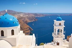 Images Dated 27th June 2011: Thira (capital city of Santorini) - greek white church and bell tower overlooking the sea
