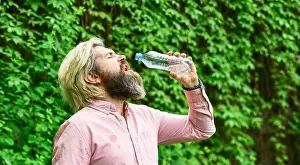 Maintain Prints: Thirsty guy drinking bottled water