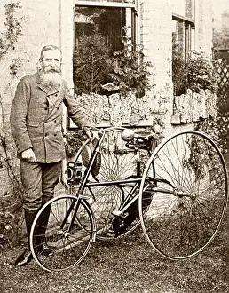 Nineteen Prints: Thomas Humber together with one of his company's tricycles c