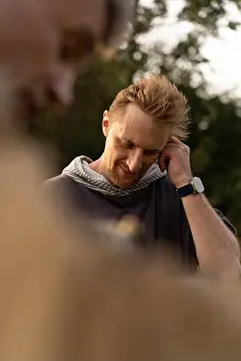 Contemplative Prints: Thoughtful Man With Beard Looking Down Outdoors In Natural Light