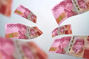 Jackpot Prints: One hundred thousand rupiah banknote flying on a white background
