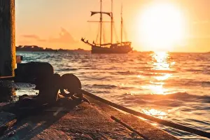 Blurred Background Prints: A three-master is anchored off the French west coast in Brittany at sunset