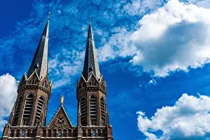 Blue Skies Prints: Tilburg, Netherlands. Two Tower Catholic Church dominating the central, down town square