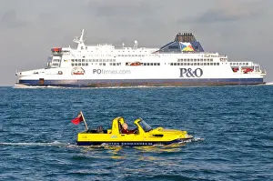 English Channel Prints: Tim Dutton crossing the English Channel in his Dutton Commander amphibious car with ferry in background