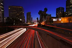Freeway Prints: Timelapse Image of Los Angeles Freeway at Night With Stunning Blue Sky