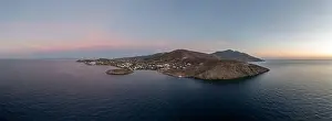 Tinos Prints: Tinos island, Cyclades Greece. Aerial panoramic drone view of Agios Ioannis bay at sunset