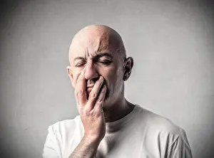 Bald Prints: Tired bald man