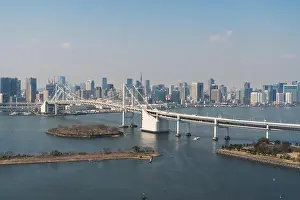 Tokyo Bay with a view of the Tokyo skyline and Rainbow Bridge in tokyo, Japan