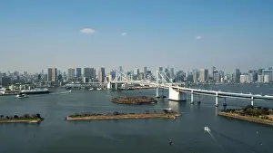 Tokyo Bay with a view of the Tokyo skyline and Rainbow Bridge in tokyo, Japan