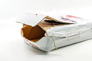 Destroy Prints: Torn white parcel box on white background