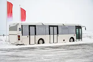 Mode Of Transport Prints: Tourist bus drove through snow capped streets with winter scenery in Iceland