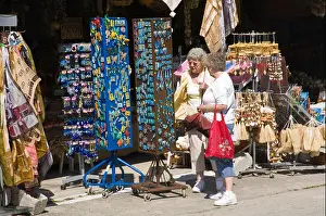 Korfu Prints: Tourist shops selling souvenirs in the mountain village of Makrades on the Greek Mediterranean island of Corfu Greece