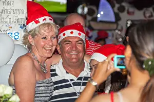 Phuket Prints: Tourist taking photos in a bar on Bangla Road, Patong, Phuket, Thailand
