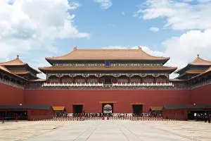 Tourist waiting entrance to gate at Beijing ancient royal palaces of the Forbidden City in Beijing, China. Asian tourism, history building, or traditi