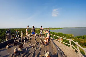 Groups Prints: Tourists bathing in mud bath, Volcan de Lodo El Totumo