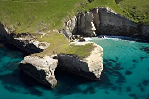 Oceans Prints: Tourists and Cliffs at Tunnel Beach Dunedin South Island New Zealand aerial