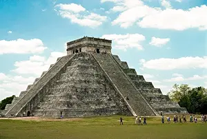 Tourists who arrive early avoid the crowds and hot midday sun at El Castillo (The Castle), also known as the Temple of Kukulcan