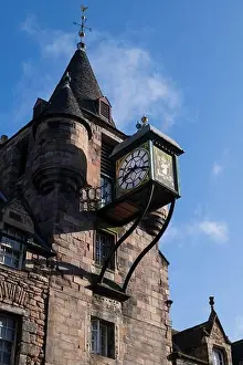Haunted Prints: Tower with clock of Canongate Tolbooth and Tolbooth Tavern at Royal Mile in city of Edinburgh