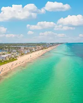 Town of Hollywood Beach, Florida during a beautiful sunny afternoon and minimal clouds