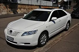 The Rocks Prints: Toyota Camry car parked in The Rocks, Sydney Harbour, Sydney, New South Wales, Australia