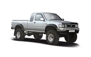 Toyota Hilux pickup truck side view isolated on white background