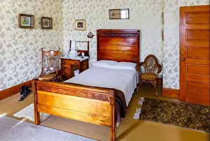 Vermont Prints: Traditional 19th century bedroom and carved wooden double bed in the museum at Billings Farm & Museum