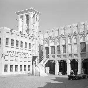 Qatar Prints: Traditional architecture in Souq Waqif in Doha, Qatar, featuring a wind tower