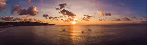 Blue Island Prints: Traditional Balinese boat Jukung at Jimbaran beach at sunset in Bali