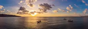 Blue Island Prints: Traditional Balinese boat Jukung at Jimbaran beach at sunset in Bali