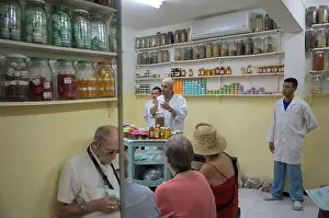 Shelves Prints: Traditional Berber pharmacy (herbal shop) in the souk. Marrakech. Morocco. North Africa