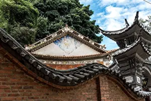 Brick Wall Prints: Traditional Chinese Architecture with Intricate Roof and Wall Details
