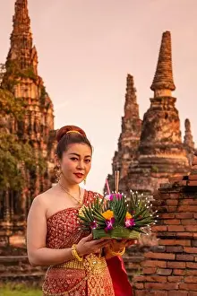 Traditional Dress Prints: a traditional dress women on the Loy Krathong Festival at the Wat Chai Watthanaram in the City Ayutthaya