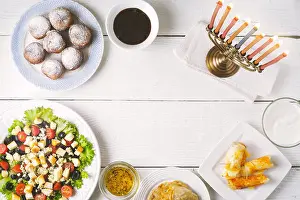 Chandelier Prints: Traditional Hanukkah dishes on the white wooden table top view